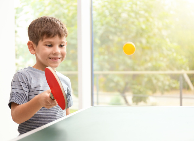 Royal Crest Warwick - Warwick, RI - Kid playing table tennis
